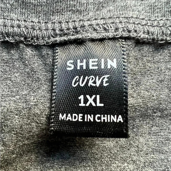 BUNDLE: (1) Bagatelle pleather shorts, (1) Shein tee, (1) wood heart earrings - Picture 13 of 16